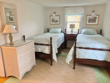 Falmouth Cape Cod vacation rental - Second floor bedroom feat. two twin beds and wicker dressers.