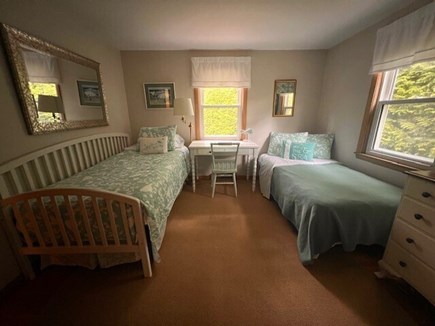 Falmouth Cape Cod vacation rental - First floor bedroom shown with trundle set up for second sleeper.