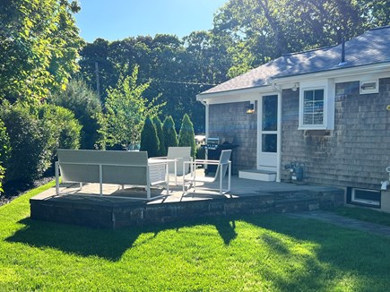 Yarmouth Port Cape Cod vacation rental - Stone Patio w/ Seating Surrounding Gas Firepit & Grill!