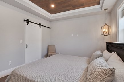 Falmouth Cape Cod vacation rental - King size bed. Walk-in closet with sliding Barn Door.