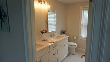 West Yarmouth Cape Cod vacation rental - Primary bath with dual sinks.
