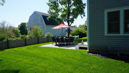 West Yarmouth Cape Cod vacation rental - Back yard patio and dining set with seating for 10.