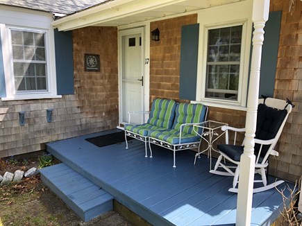 South Yarmouth Cape Cod vacation rental - The front porch is a welcoming retreat from the day’s sun.