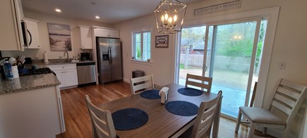 West Hyannisport Cape Cod vacation rental - DR/Kitchen, slider to brand-new patio & yard.