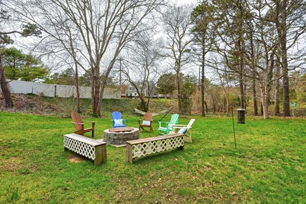 Harwich Cape Cod vacation rental - Fire pit in large back yard