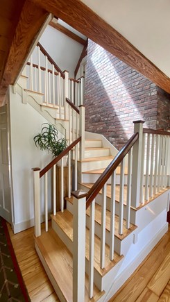 North Falmouth Cape Cod vacation rental - Open entry and stairway with beautiful wood and brick features.