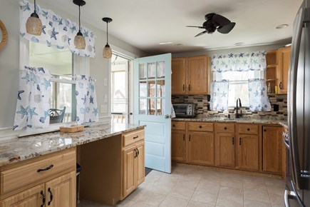 Centerville Cape Cod vacation rental - Fully stocked kitchen with door out to 10x16 screened porch