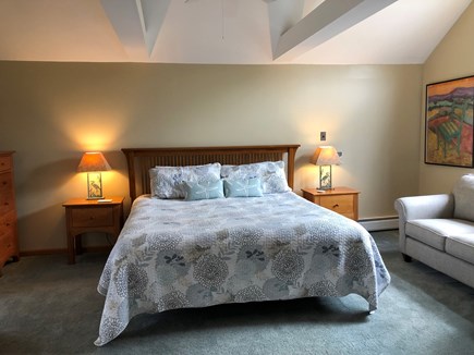 East Harwich Cape Cod vacation rental - Primary bedroom with king bed, vaulted ceiling & love seat