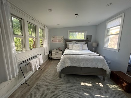 Truro Cape Cod vacation rental - Separate queen bedroom interior, w AC, desk area, tv, built-ins.