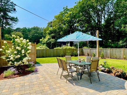 Yarmouth Port Cape Cod vacation rental - Expansive patio and completely fenced in backyard