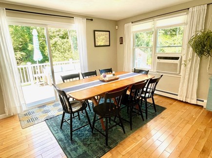 Yarmouth Port Cape Cod vacation rental - Dining Table connected to the living area- has extra leaf for 10
