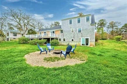 Brewster Cape Cod vacation rental - Fire pit with four adirondack chairs