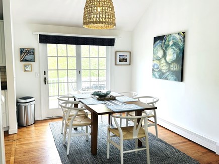 Brewster Cape Cod vacation rental - Dining area with seating for six (eight with leaf) and access to the deck through the sliding glass doors - 671 Great Fields Rd Brewster Cape Cod - Be