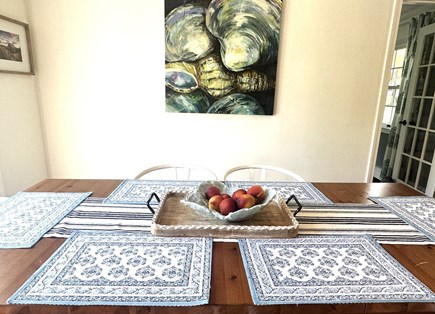 Brewster Cape Cod vacation rental - Gather together at this welcoming table overlooking the deck and connected to the adjoining spaces - 671 Great Fields Rd Brewster Cape Cod - Beach Gla