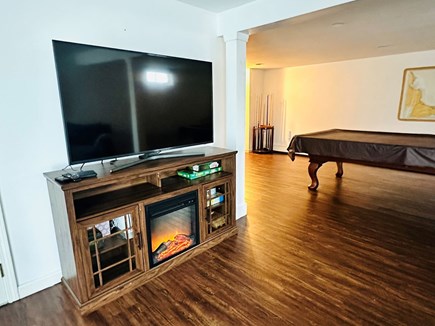 Brewster Cape Cod vacation rental - Lower level large flatscreen TV above fireplace - 671 Great Fields Rd Brewster Cape Cod - Beach Glass - New England Vacation Rentals