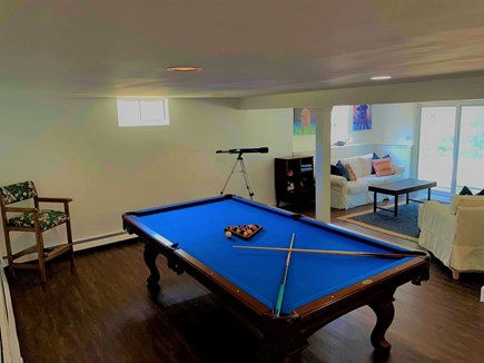 Brewster Cape Cod vacation rental - Time for fun! The lower level includes living, gaming and sleeping spaces as well as access to the backyard and fire pit - 671 Great Fields Rd Brewste