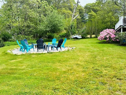 Brewster Cape Cod vacation rental - Fire pit area with view of hammock beyond - 671 Great Fields Rd Brewster Cape Cod - Beach Glass - New England Vacation Rentals