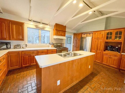 Chatham Cape Cod vacation rental - Here is the kitchen with gas stove and large refrigerator.