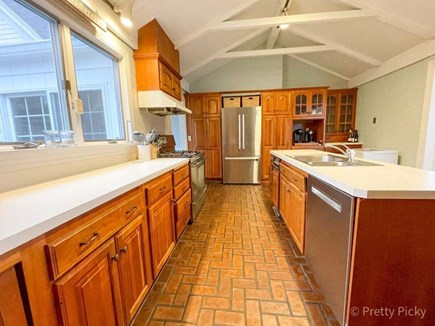 Chatham Cape Cod vacation rental - Here is the kitchen with gas stove and large refrigerator.