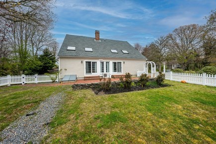 Orleans Cape Cod vacation rental - Fenced back yard with brick patio off the living area!