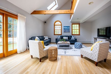 Orleans Cape Cod vacation rental - Open concept Living Room with TV and sliders out to the patio