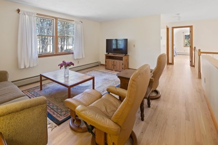 Eastham, Sunset House Cape Cod vacation rental - Upper level seating area with 55 inch smart TV and cable
