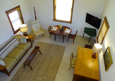 Provincetown Cape Cod vacation rental - Sunny vaulted living area with TV, dining area