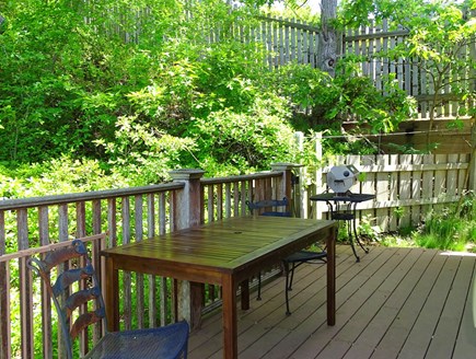 Provincetown Cape Cod vacation rental - Deck area with seating and grill – private gardens