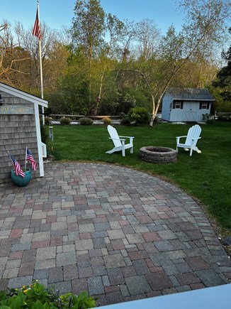Dennis Cape Cod vacation rental - Fire pit and bunkhouse ready for s’mores!