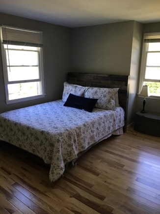 Waquoit Bay, East Falmouth Cape Cod vacation rental - Bedroom with queen bed and attached half bath