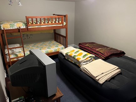 Centerville Cape Cod vacation rental - Bunk beds and queen air mattress in basement for the kids.