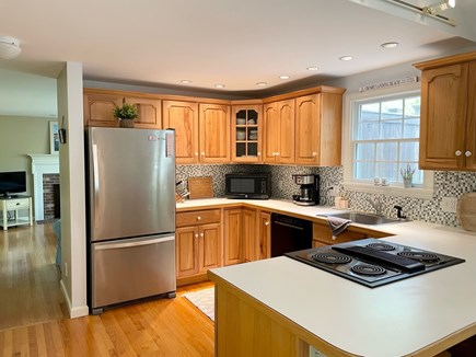 Brewster Cape Cod vacation rental - Open concept kitchen and dining area.