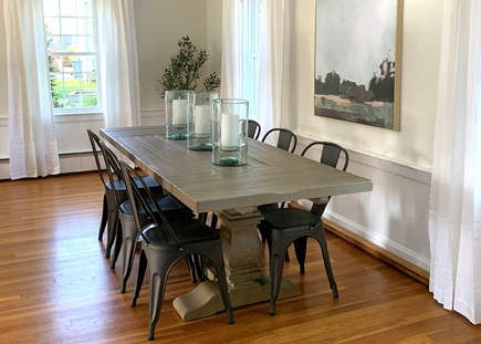 Harwich Port Cape Cod vacation rental - Large RH dining room table with extra chairs stored in basement.