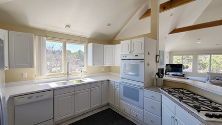 Truro Cape Cod vacation rental - Nicely-equipped kitchen opens to living room and dining area