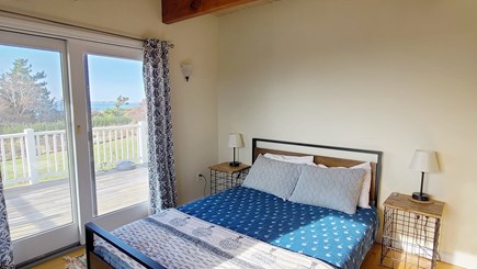 Truro Cape Cod vacation rental - First floor bedroom with queen and slider to front deck