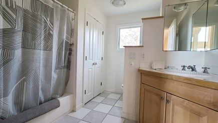 Truro Cape Cod vacation rental - First floor bathroom with tub/shower
