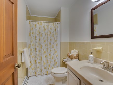 West Falmouth Cape Cod vacation rental - First-floor bathroom with shower.
