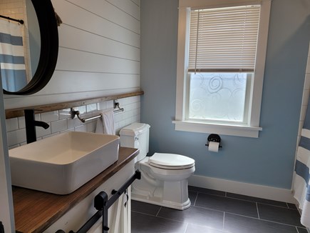 Falmouth Cape Cod vacation rental - First level hall bath with laundry