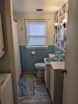South Dennis Cape Cod vacation rental - Full bath with Shower, Bath Tub, and stacked washer / dryer.