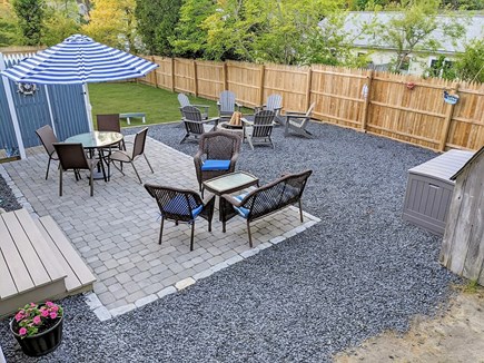 South Dennis Cape Cod vacation rental - Rear Yard with Patio, Outdoor Shower, Gas Grill and Fire Pit