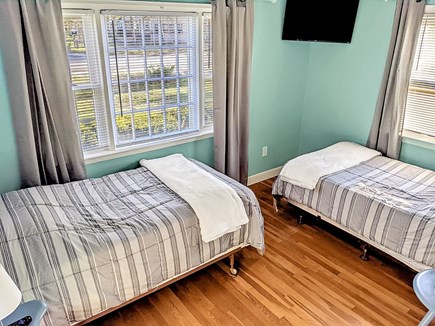 South Dennis Cape Cod vacation rental - Bedroom with two twin beds and a smart TV