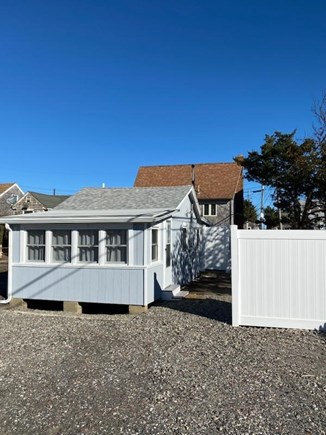 Plymouth, White Horse Beach MA vacation rental - Cottage parking and privacy fence to yard