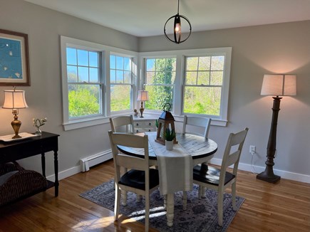Marion MA vacation rental - Causal eating area over looking the water and private backyard
