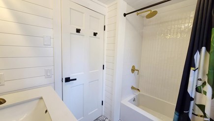 Wellfleet Cape Cod vacation rental - Second floor master ensuite bathroom with tub/shower