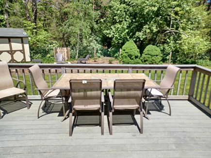 Yarmouth Cape Cod vacation rental - Deck with table and 6 chairs to eat out.