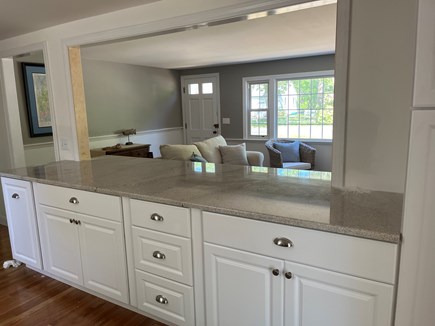 Dennis Cape Cod vacation rental - New cabinets with stone counters and breakfast bar