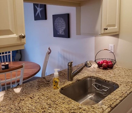 New Seabury Cape Cod vacation rental - Kitchen pass-through to living and dining area.