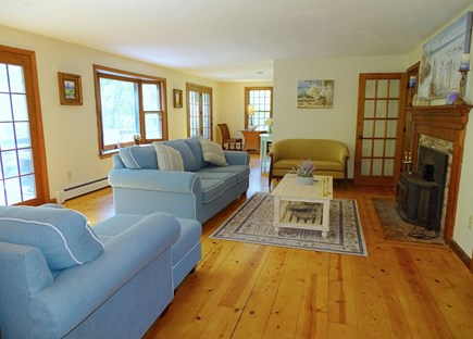 Sandwich Cape Cod vacation rental - Living room with several couches and sunlight 