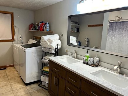 Hyannis Cape Cod vacation rental - Master bathroom with double sink vanity . Towels,Washer and dryer