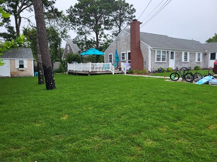 Dennis Port Cape Cod vacation rental - Street view - Front of house w/ large lawn & entertaining deck